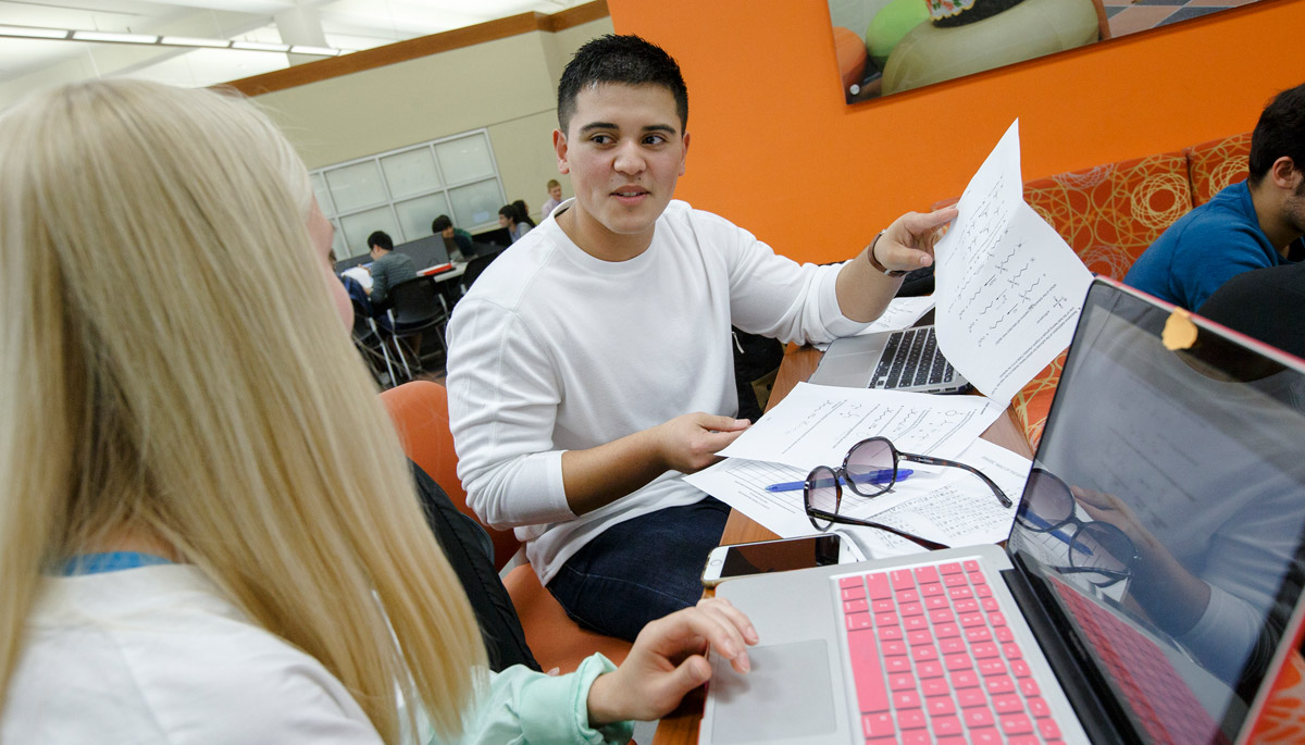 Two students studying at the center.